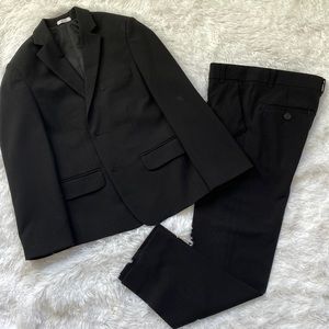 Calvin Klein boys 2 piece black suit in size 8 regular